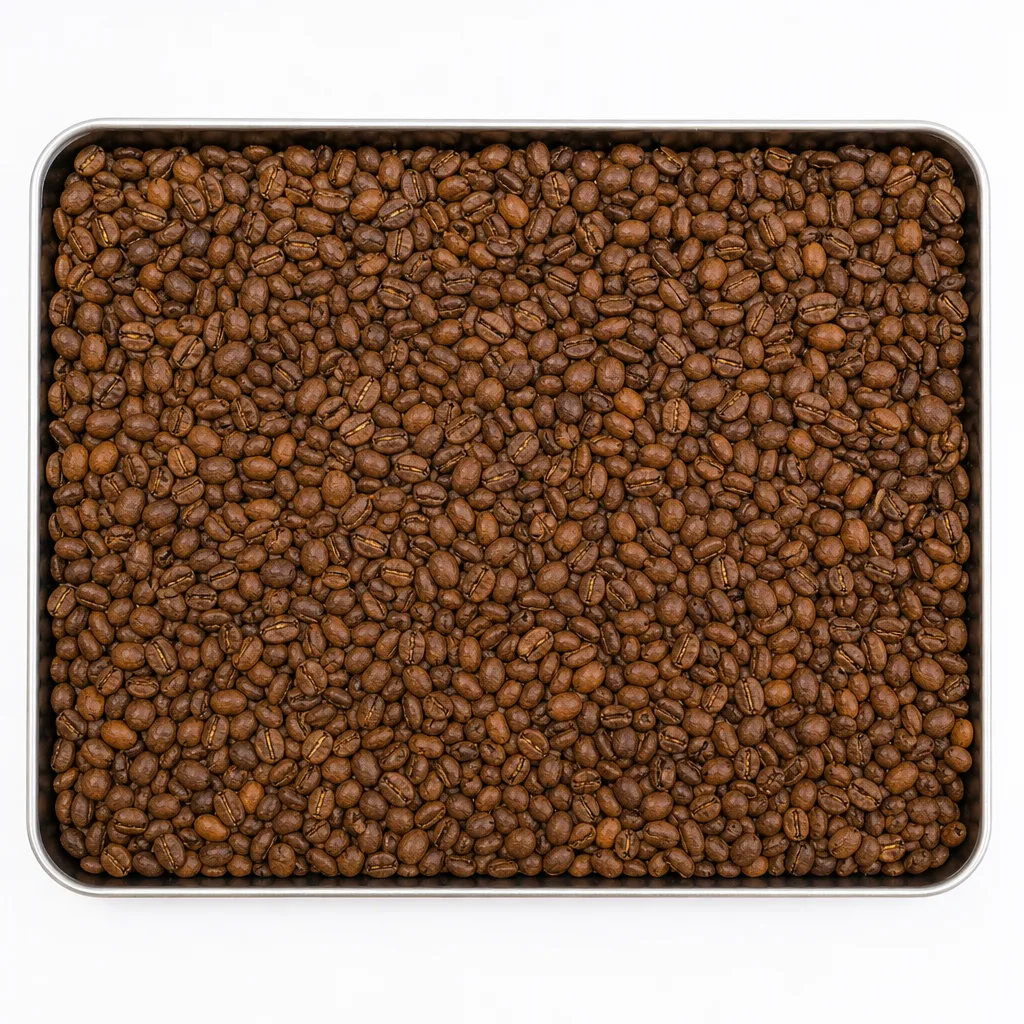 Mid-brown medium-roast San Agustin beans in a shallow steel tray.