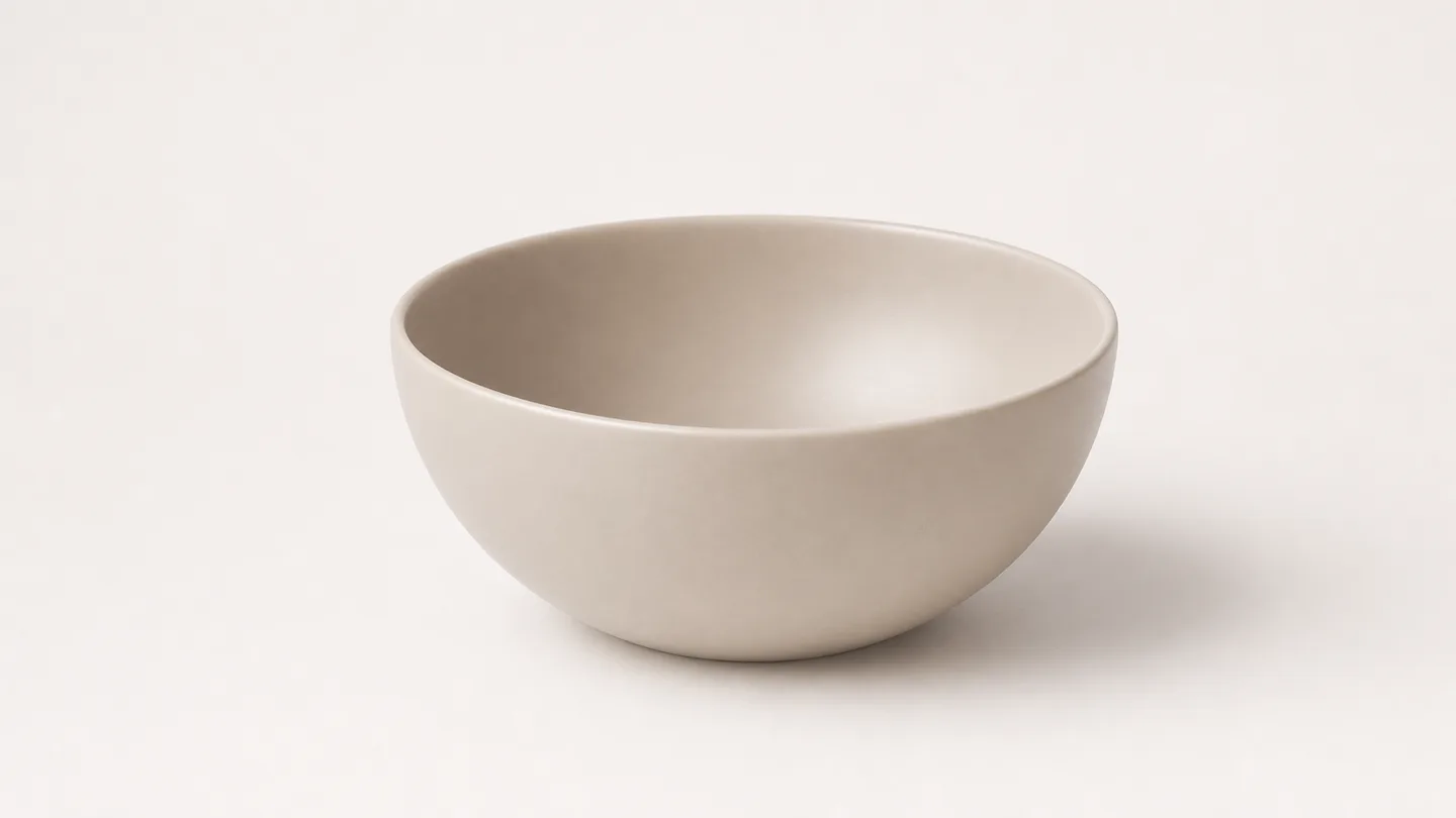 Single matte studio object on a pale seamless surface